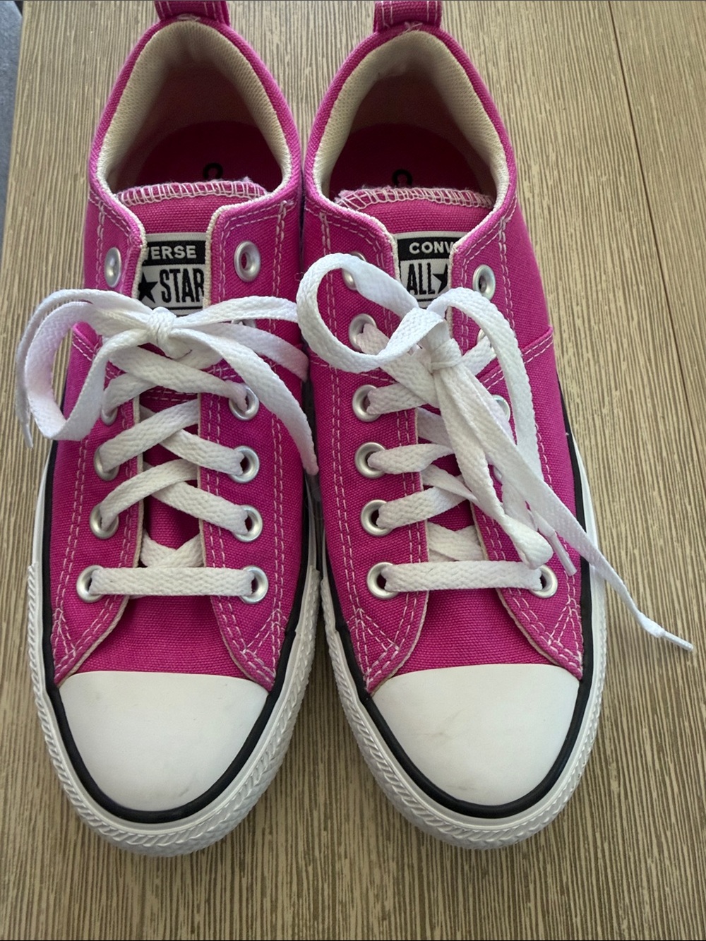Converse women’s Hot Pink Low Top Canvas Sneakers with White Laces